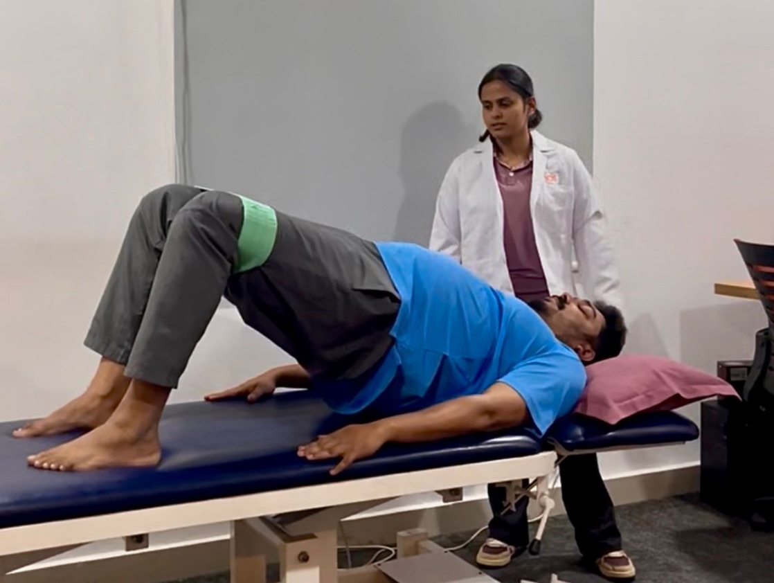 Physiotherapist guiding post-surgical exercises